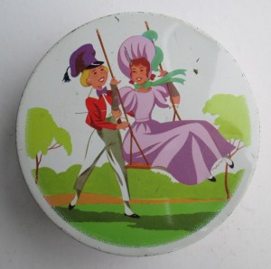 The Quality Street child Soldier & Lady on a swing
